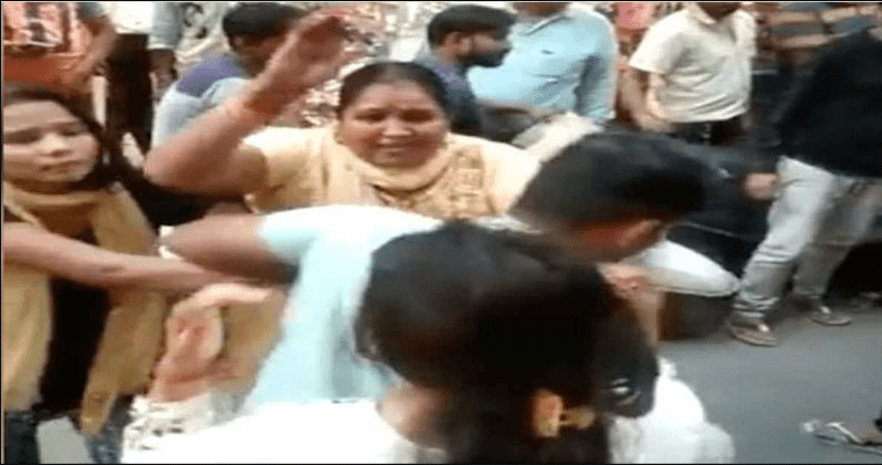 wife-beat-husband-on-karwa-chauth-caught-with-girlfriend-while-shopping-in-market-see-viral-video