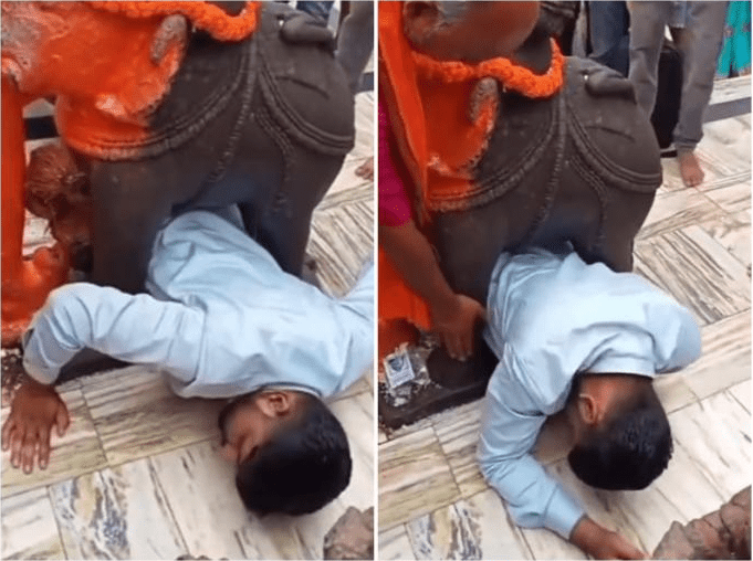 devotee-trapped-between-an-elephant-statue-in-a-temple-in-gujaratvideo-going-viral